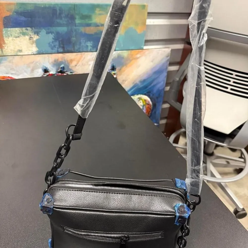Black leather crossbody bag with chain strap